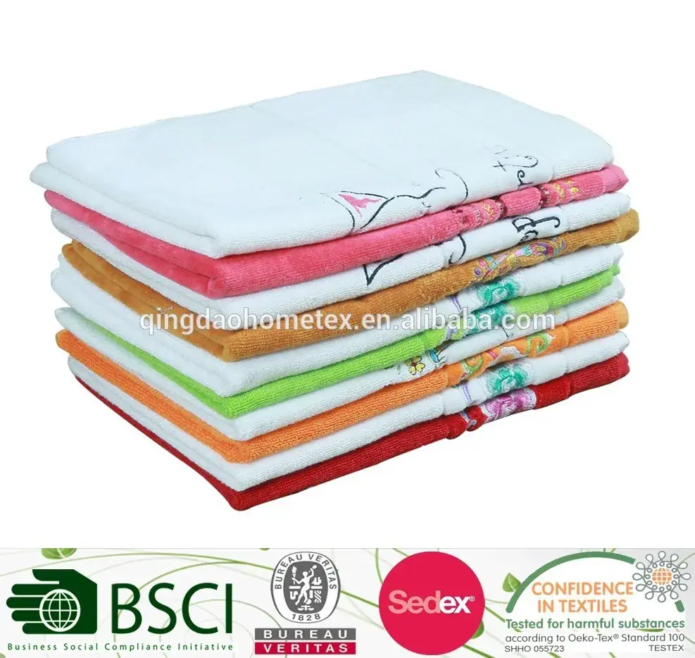 Stack of folded towels in assorted colors with white tops, on a white background with certification logos below