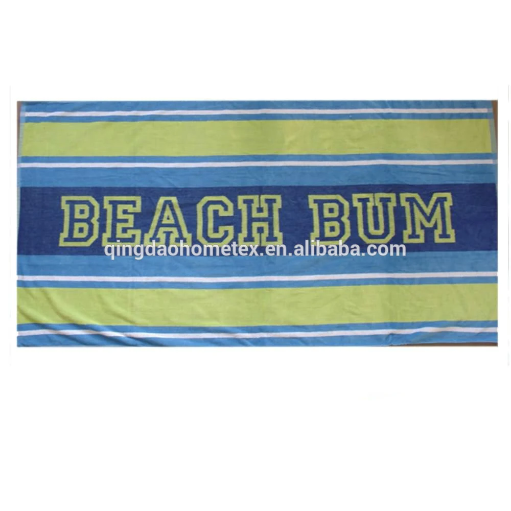 Striped beach towel in blue and green with 'BEACH BUM' printed across the center