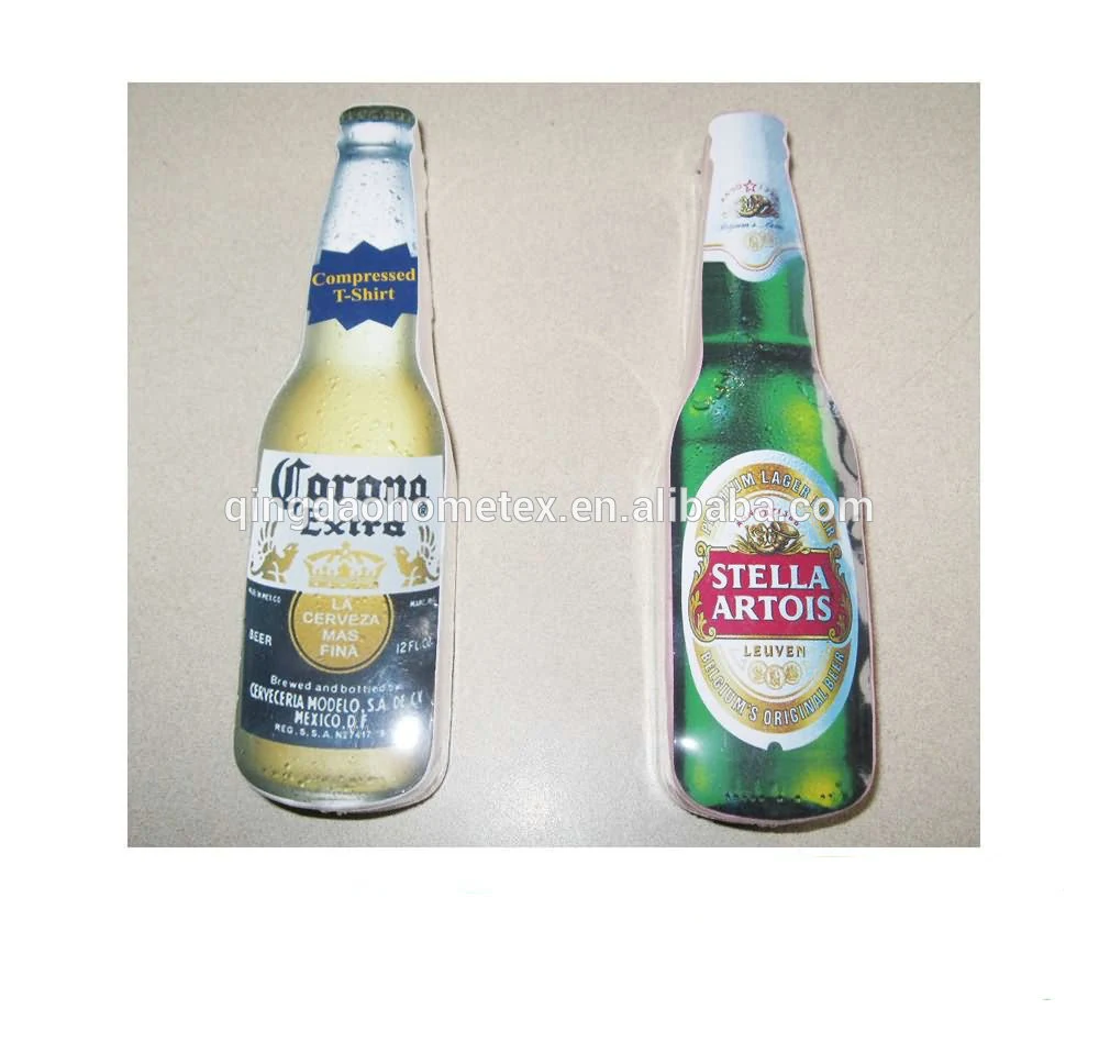 Two inflatable bottle-shaped items printed with Corona Extra and Stella Artois branding on a beige surface