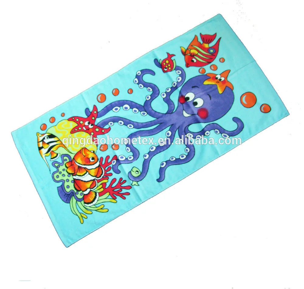 Turquoise beach towel with a cartoon purple octopus, clownfish and starfish print, shown at an angle on a white background