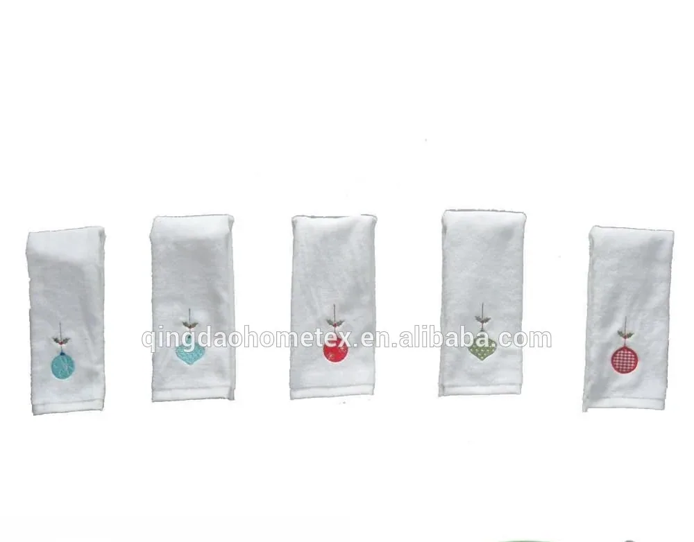Five white towels with small embroidered motifs in different colors on a plain background, with BSCI and Confidence in Textiles logos below.