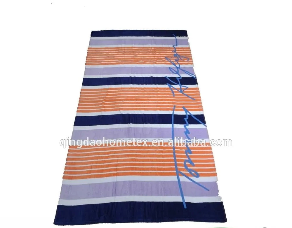 Striped beach towel with orange, purple, and navy bands laid flat with certification logos below.