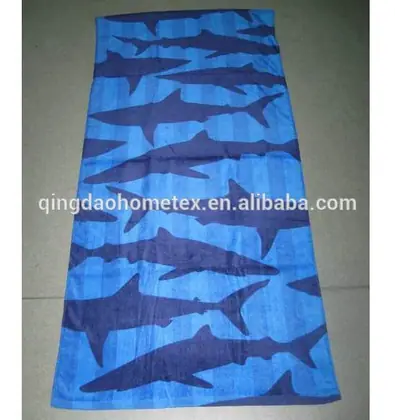 Blue 100% cotton beach towel with reactive printed dolphin design, 70x140 cm