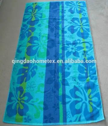 Blue 100% cotton jacquard beach towel with woven flower design, 70x140 cm