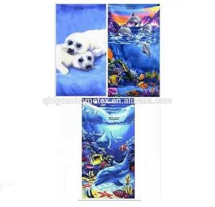Three printed beach towels featuring baby