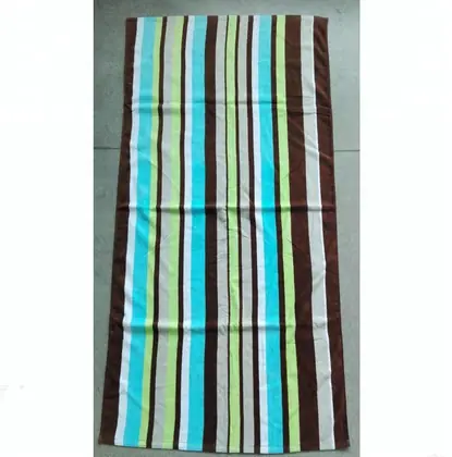 Vertical striped towel in brown, turquoise, lime green, and white
