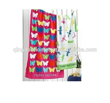 100% cotton velour beach towel with printed butterfly and dragonfly pattern, 75x150 cm, plain colour background