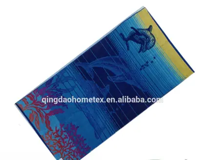 A blue and yellow printed fabric featuring a dolphin and coral reef design, accompanied by BSCI and Oeko-Tex logos.
