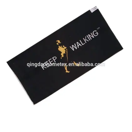A black rectangular doormat with a gold silhouette of a hiker and the text KEEP WALKING.