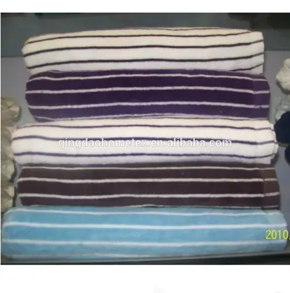 Stack of folded striped towels in white, purple, brown, and blue.