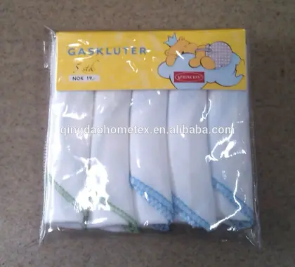 Pack of five white dish towels with blue and green trim in clear plastic packaging with a yellow header card.