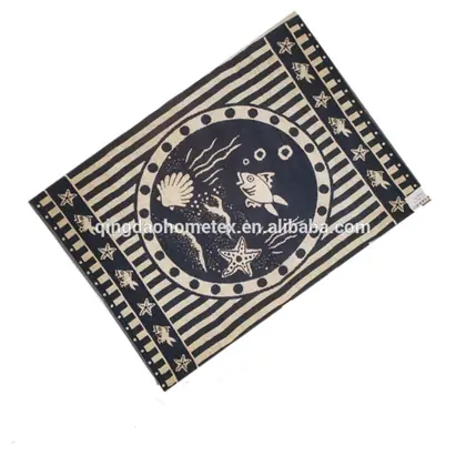 Navy blue and white striped beach towel with printed sea creatures, laid flat on white background