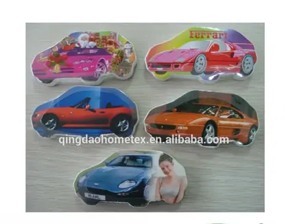 Car-shaped printed cushions arranged on a light surface, with BSCI and Confidence in Textiles certification logos below