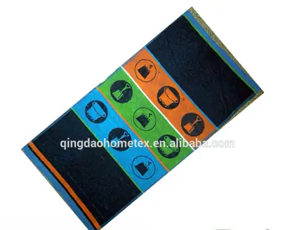 Printed beach towel with circular motif stripes in blue, green, and orange on a white background, shown diagonally