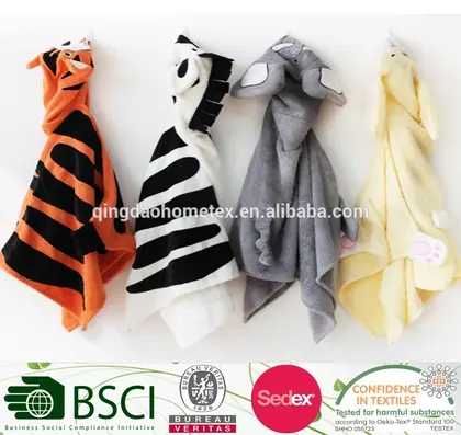 Four animal-themed baby hooded towels in tiger, zebra, gray, and yellow designs laid flat on a white background