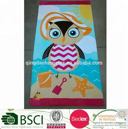 Printed beach towel with cartoon owl in sun hat, bucket, spade and starfish design