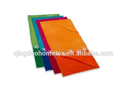 Four colorful beach towels in orange, magenta, blue, and green with starfish embroidery, fanned on a white background