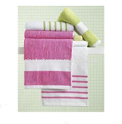 Folded striped towels in pink, white, and green stacked and hanging on a rail