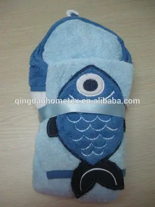 Folded blue fish-shaped children's hooded towel with embroidered fish design, tied with a satin ribbon