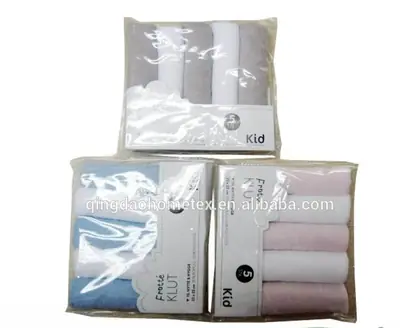 Three retail packs of rolled baby towels in gray, blue, and pink with BSCI and Confidence in Textiles certification logos below