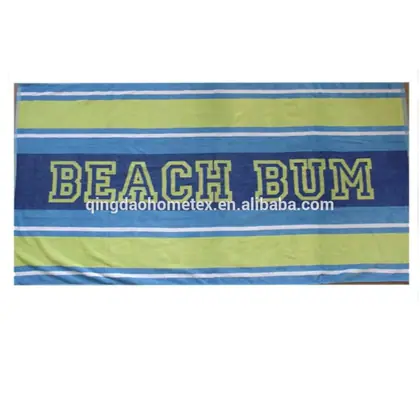 Striped beach towel in blue and green with 'BEACH BUM' printed across the center