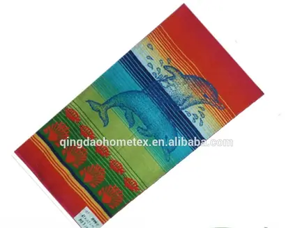 Colorful striped beach towel with dolphin print, tilted, with BSCI and Oeko-Tex logos below