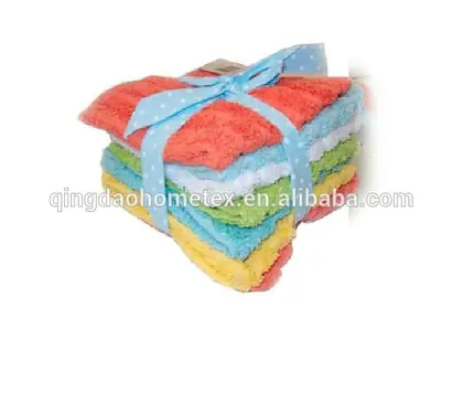 Stack of colorful microfiber cleaning cloths in coral, blue, green, and yellow tied with a light blue polka dot ribbon
