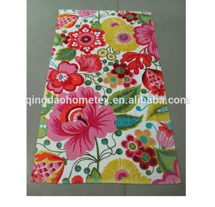 Pink 100% cotton beach towel with reactive printed floral design, 70x140 cm, velour face, woven construction
