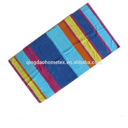 Blue and multicoloured 100% cotton rainbow stripe jacquard beach towel, 70x140 cm, woven pattern visible