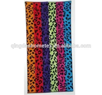 Colorful leopard print towel with vertical stripes in orange, red, purple, green, pink and blue