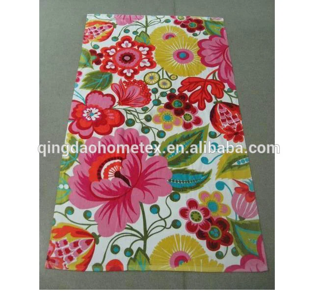 Pink 100% cotton beach towel with reactive printed floral design, 70x140 cm, velour face, woven construction