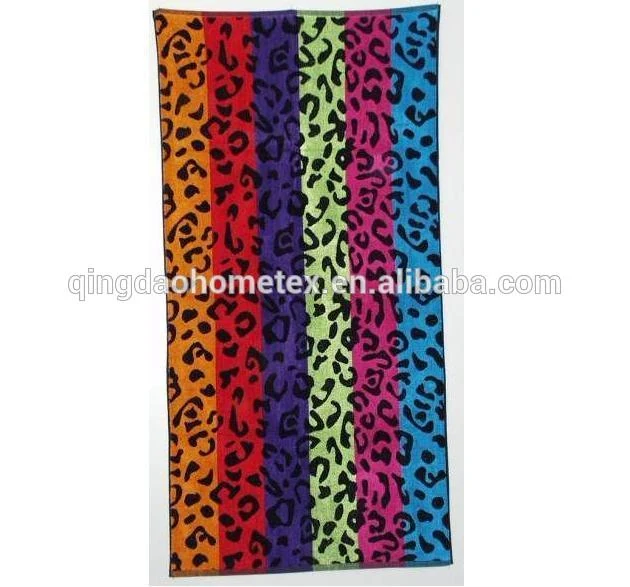 Colorful leopard print towel with vertical stripes in orange, red, purple, green, pink and blue