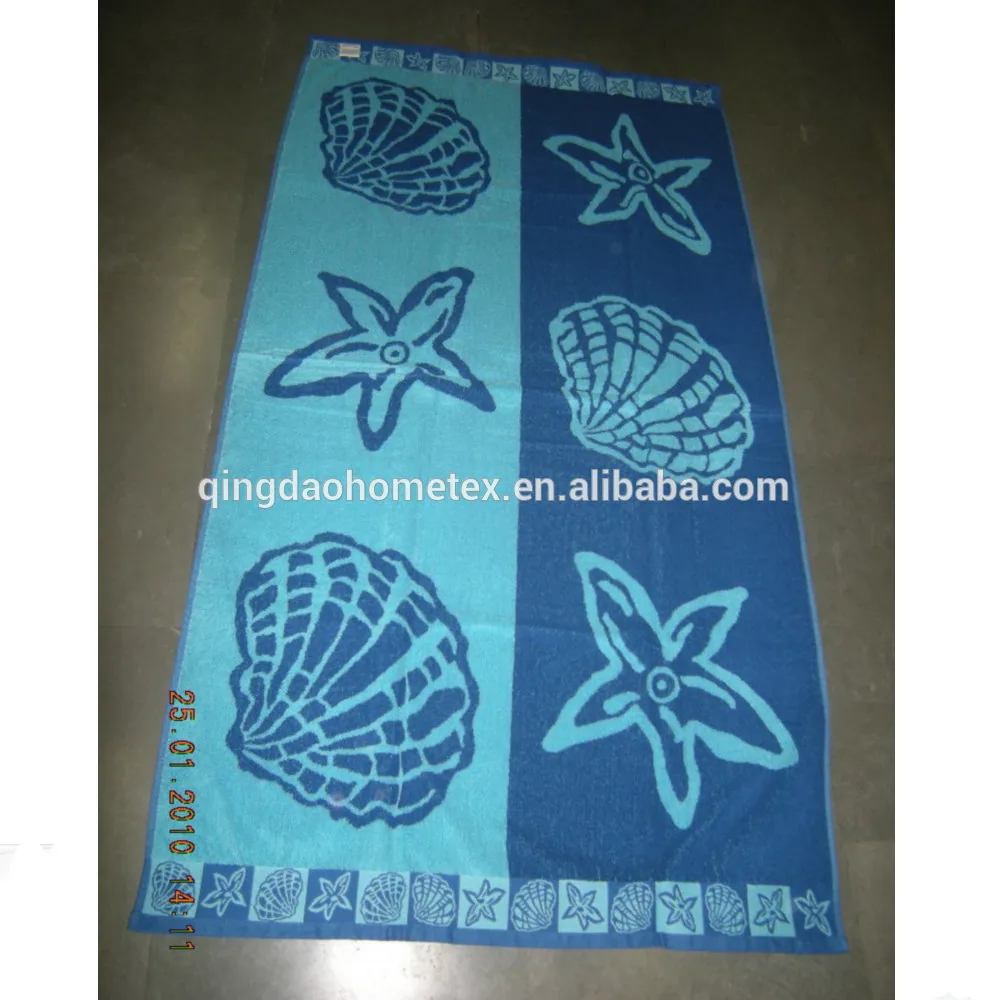 Blue and aqua beach towel with starfish and seashell