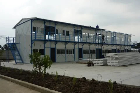Two-storey prefab building with insulated panels used for classrooms and offices