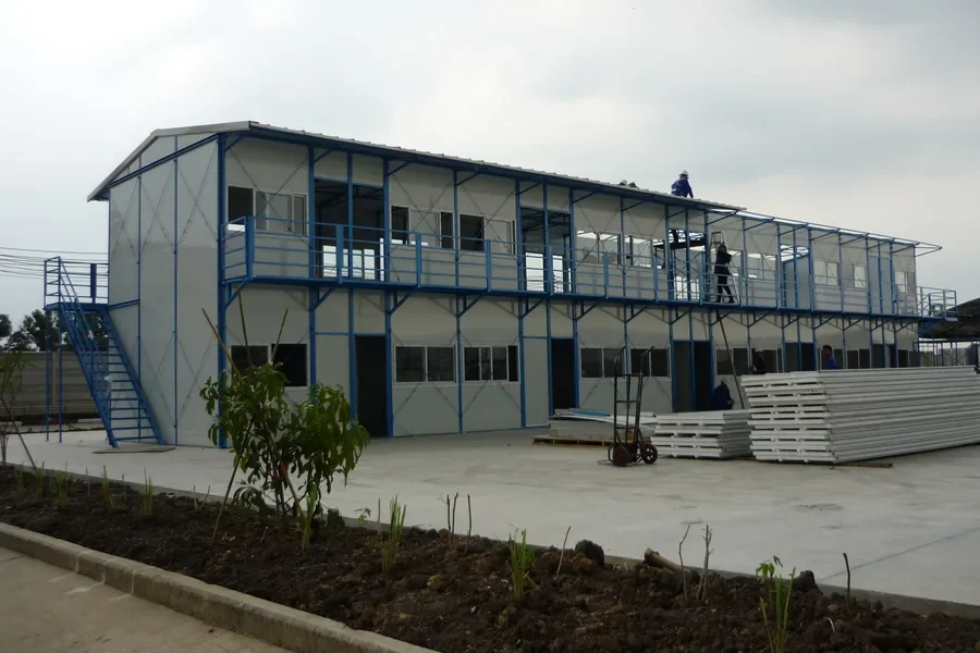 Completed two-storey prefab building with steel frame and insulated panels in Thailand