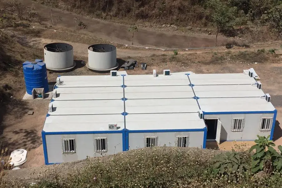 Accommodation camp of prefab buildings serving a hydropower project in El Salvador