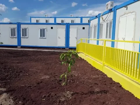 Camp walkway with external staircases and railings
