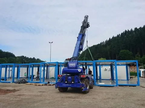 Modules craned into position on a European project site