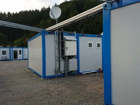 Completed container accommodation modules connected on site