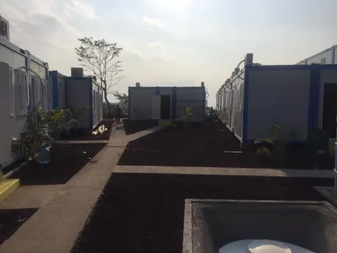 Rows of container accommodation units on a completed worker camp