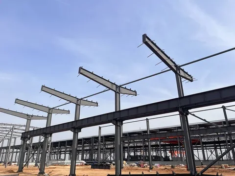 Pre-engineered steel portal frame erected against an open sky
