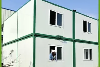 Container units stacked two high on a prepared site