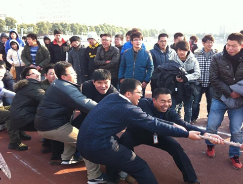 A company sports day. It is a small factory and the people in it have worked together for years.