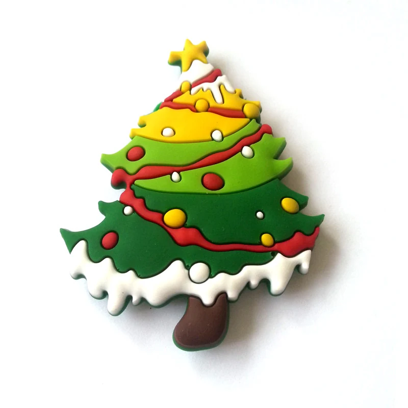 Soft PVC magnet of a Christmas tree with red and yellow garlands baubles a star and a snow covered base