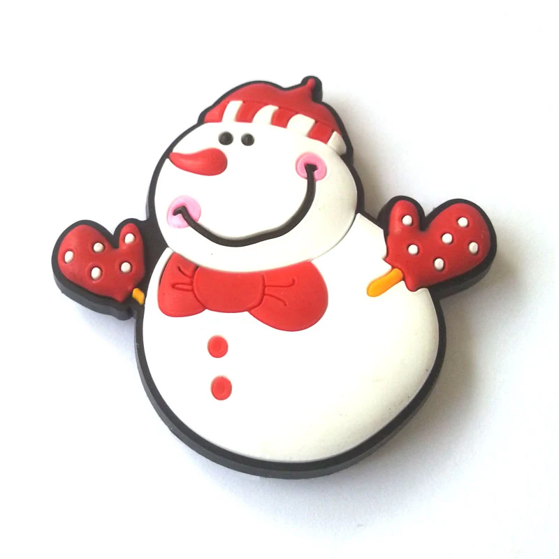 Soft PVC magnet of a smiling snowman wearing red mittens a red bow tie and a striped headband