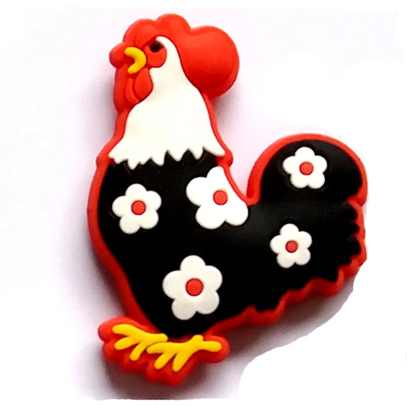 Soft PVC magnet of a rooster with a red comb white head and black body covered in white and red flowers