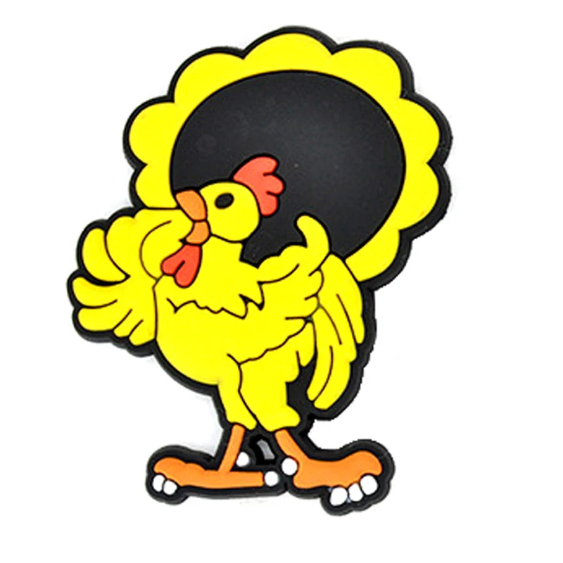 Soft PVC magnet of a yellow rooster standing in front of a large black scalloped disc