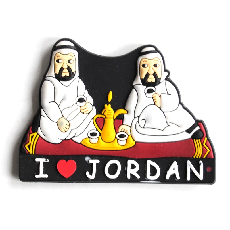 Soft PVC magnet of two seated men in white robes with a coffee pot on a red patterned rug above the words I love Jordan