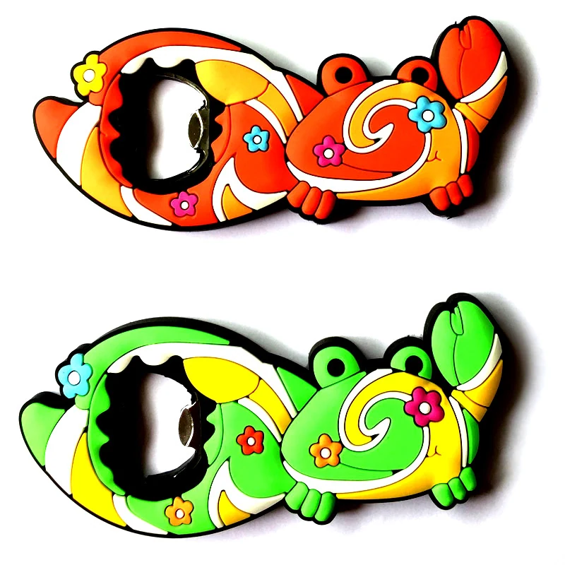 Two soft PVC bottle opener magnets shaped as an orange crab and a green gecko with flower patterns
