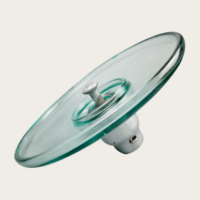 Aerodynamic glass insulator cap and ball coupling detail